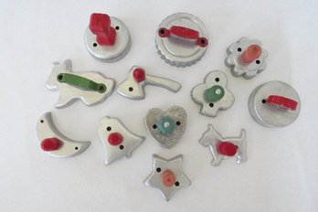 A Dozen Vintage Metal Cookie Cutters