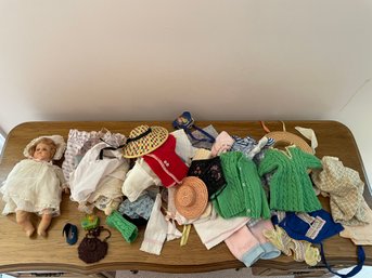 Antique Doll With Large Lot Of Doll Clothing.