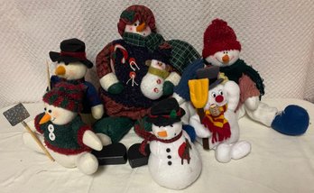 Six Stuffed Snowmen Decor