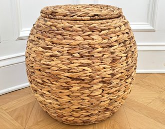 A Woven Basket By Pottery Barn