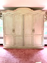 A Large French Provincial Wood Armoire