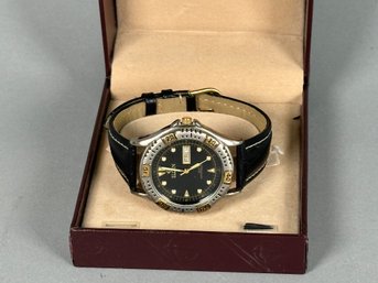 An Elgin Watch With Case