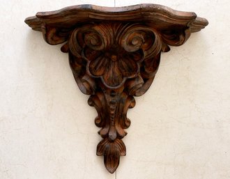 A Carved Wood Wall Shelf