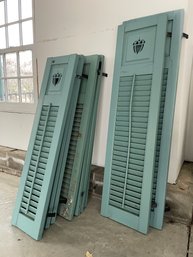 A Collection Of Over 40 Wood Shutters Including 10 With Acorn Design.