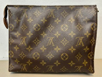 A Clutch By Louis Vuitton