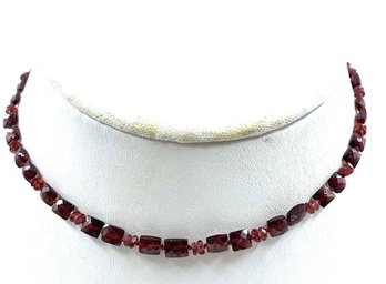 Vintage Choker Style Necklace With Garnet Colored Stones.