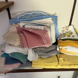 A Large Assortment Of Vintage Table Linens And Napkins