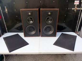 Vintage Pair Of Polk Audio Series 7 Two Way Stereo Speakers In Walnut Finish Cabinets.