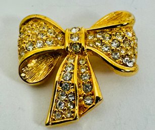 SWAROVSKI GOLD TONE CRYSTAL BOW BROOCH