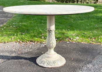 A Vintage Hollywood Regency Cast Iron Based Marble Top Dining Table