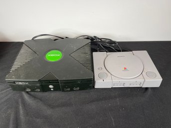 A PLAYSTATION CONSOLE AND AN XBOX, CONSOLES ONLY
