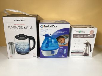 Three BRAND NEW Home Appliances - CHEFMAN Tea Infusing Kettle - Ultrasonic Humidifier & Handheld Steamer Iron