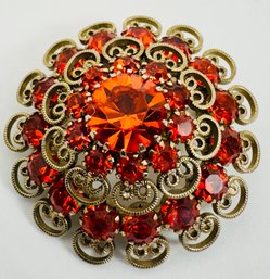 VINTAGE GOLD TONE AND ORANGE RHINESTONE BROOCH