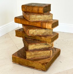 A Carved Wood Stack Of Books