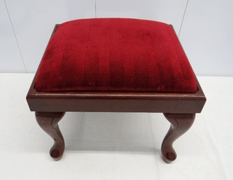 An Upholstered Foot Stool By The Bombay Company