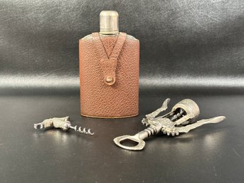 A Vintage Glass Flask In Leather Case & Two Vintage Corkscrews With Ornate Designs