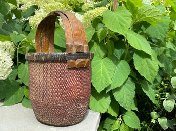 Vintage Woven Chinese Rice Basket With Bent Bamboo Handle.