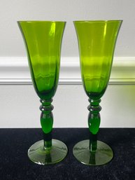 Pair Of Green Art Glass Champagne Flutes