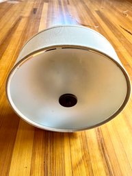 A Linen Drum Shade Ceiling Fixture With Bronze Finish Trim