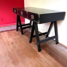 A Campaign Style Three Drawer Desk On Sawhorse Legs With Brass Hardware