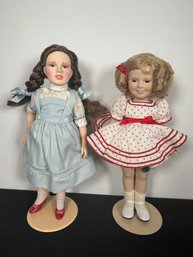 AN EFFANBEE WIZARD OF OZ DOROTHY DOLL AND A SHIRLEY TEMPLE DOLL