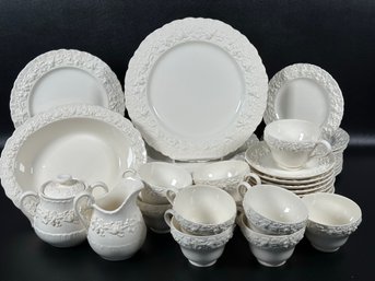 A Large Assortment Of Embossed Queensware By Wedgwood, Cream On Cream, Shell Rim