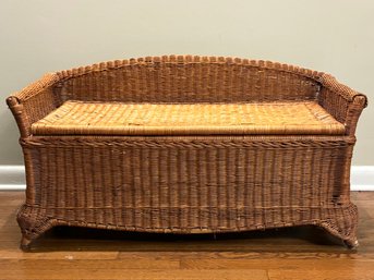 A Vintage Wicker Settle, Or Storage Bench