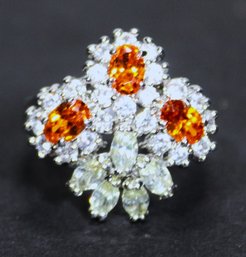 One Of Two Silver Tone Fashion Rings Set With Orange And White CZ Stones Floral Form