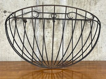 A Wrought Iron Flower Basket - Wall Mount