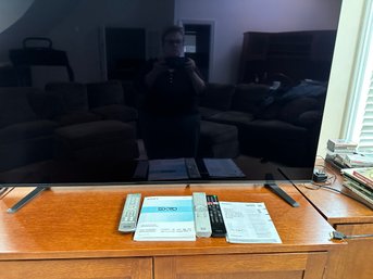 Sony 55' Flat Screen With Remotes And Stand