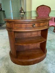 Oval Side Table With A Drawer And Shelf By Heritage.