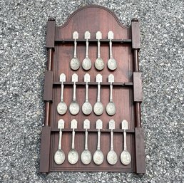 Vintage Commemorative Spoons On Wood Rack