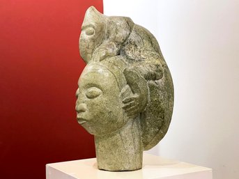 A Carved Serpentine Stone Bust, 'Magic Woman', Joseph Ndandarika (Zimbabwean, 1941-1991)