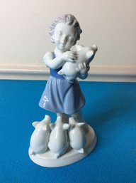 BLUE AND WHITE GIRL WITH PIGS FIGURINE MADE IN WESTERN GERMANY