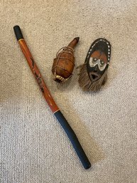 African Mask Gourd And Didgeridoo