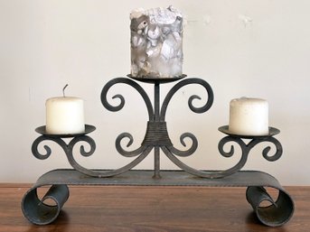 A Wrought Iron Candleholder