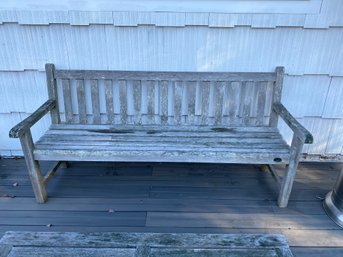 A Weathered Teak Wood Outdoor Bench By Outdoor Design.