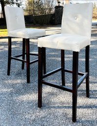 A Pair Of Modern Bar Stools In Off White Leather With Lacquered Bases