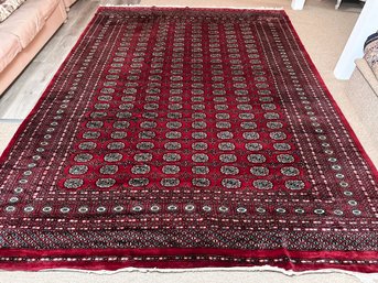 A Large Vintage Hand Knotted And Dyed Bokhara Rug