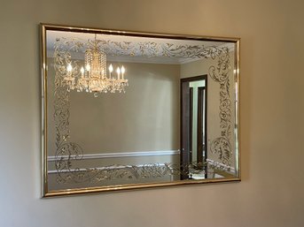 Ornate Mirror In A Metal Golden Frame.