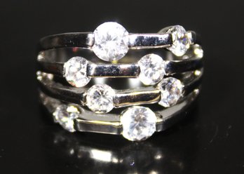 Contemporary Silver Tone Ring Having Bright White Stones Size 9