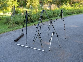 An Assortment Of 7 Very Nice, Even Professional Grade Camera Tripod's Of All Sizes