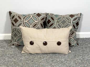 A Pretty Grouping Of Coordinated Toss Pillows