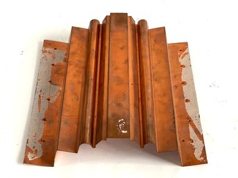 A Pressed Copper Architectural Panel