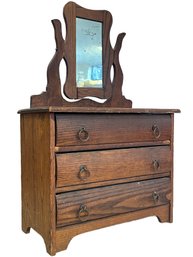 An Antique Salesman Sample Vanity