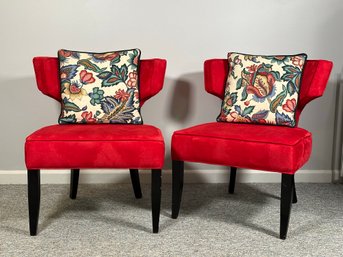 A Pair Of Matching Occasional Chairs In Red Microsuede With Jacobean Print Pillows