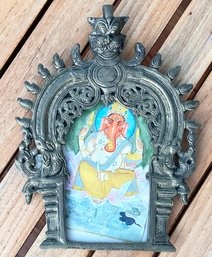 A Ganesha Print In Ornate Antique Metalwork Frame