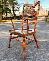 A Grand 19th Century Carved Tiger Maple Captain's Chair