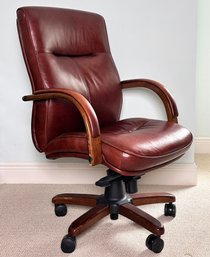 A Modern Adjustable Height Executive Chair In Chestnut Leather