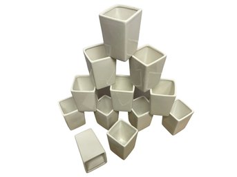 Twelve Small White Ceramic Planters